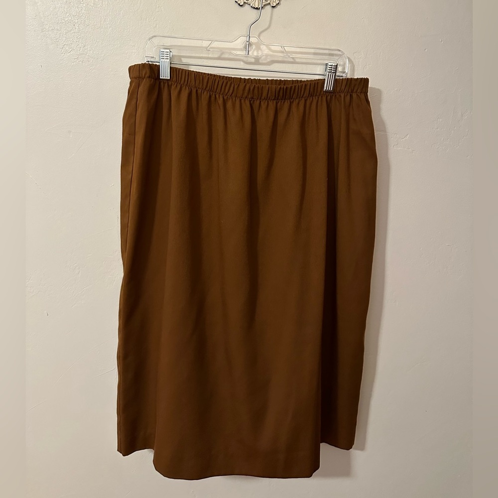 Women’s size 20 camel brown high-waisted midi skirt.